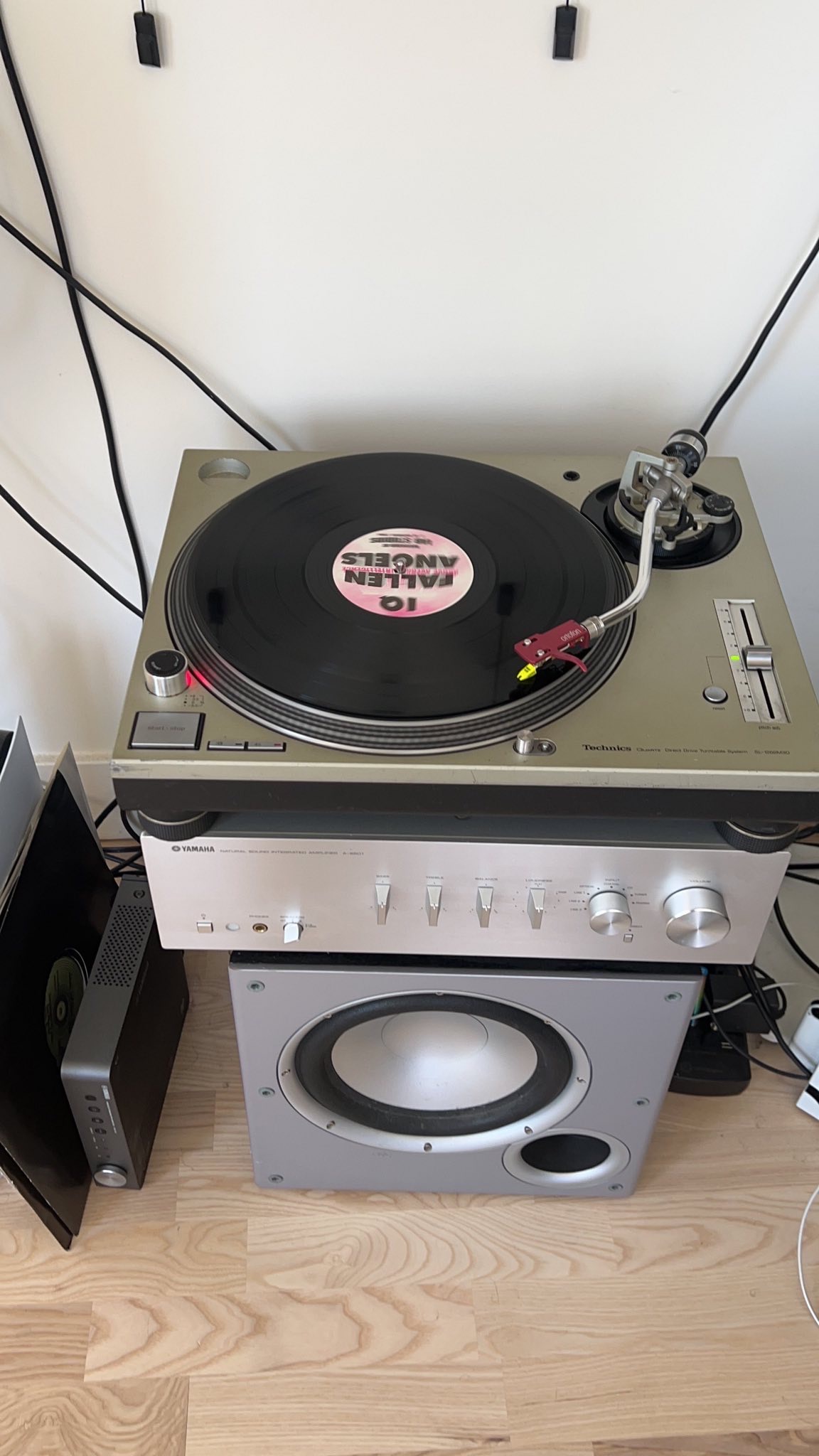 my 'fallen angels - hello lover ep' record on top of the aforementioned turntable and amplifier